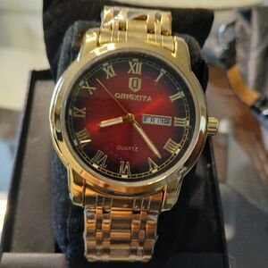 watch fits any size wrist. removable links. red & gold. roman numerals. 41 mm